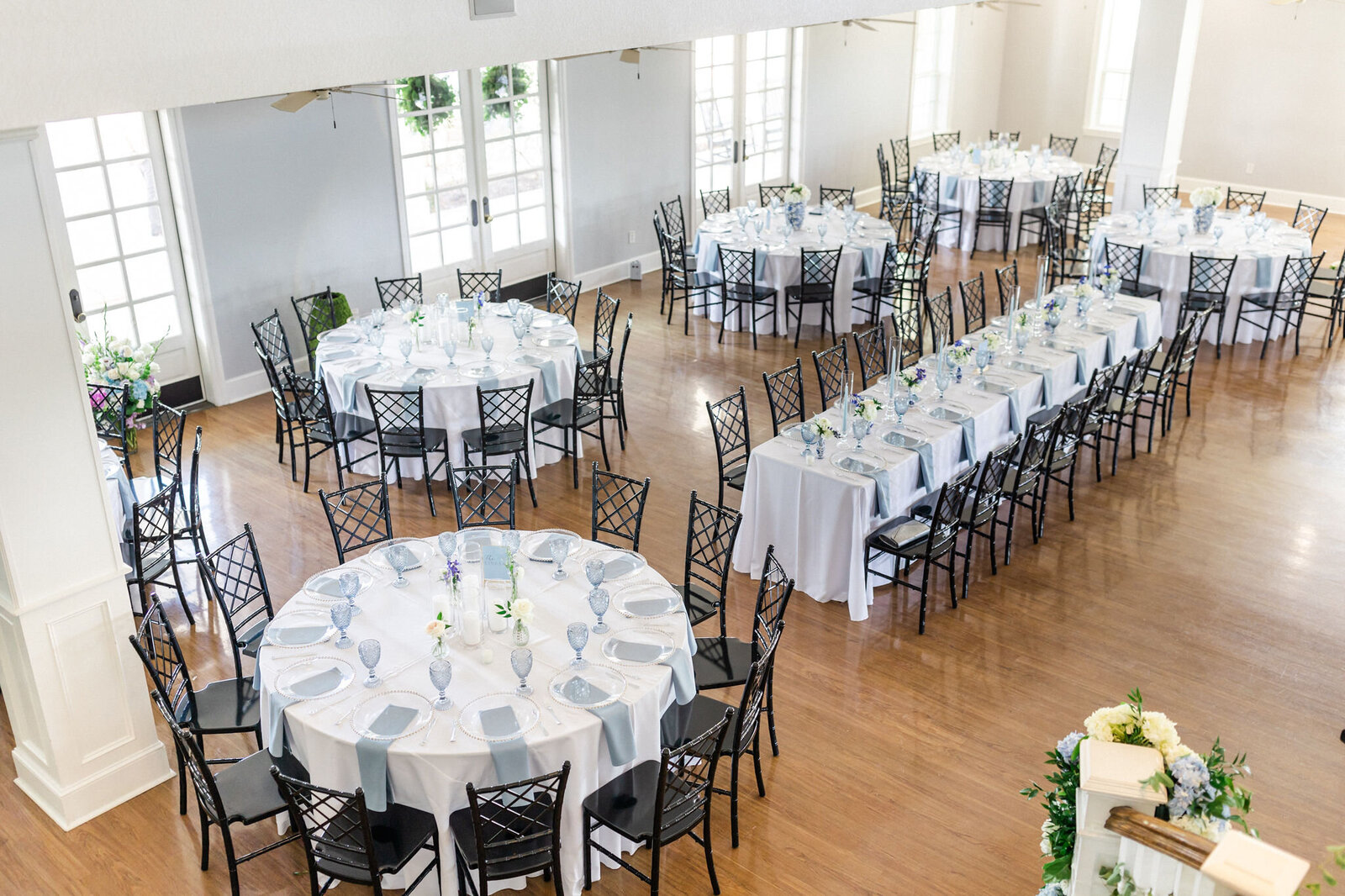 Reception tables set up in Acre 31 ballroom.