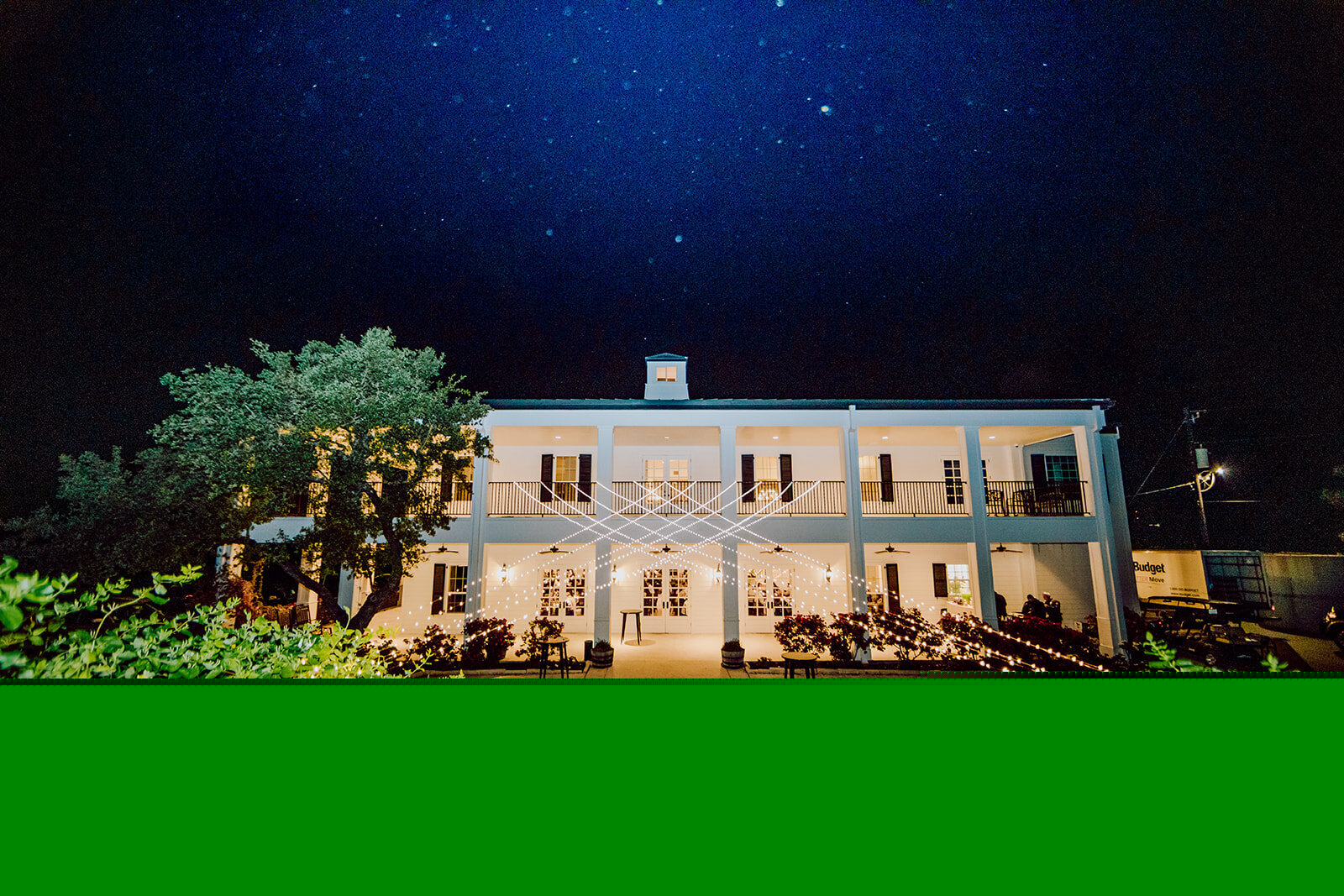 Acre 31 adorned with string lights for an evening wedding reception.